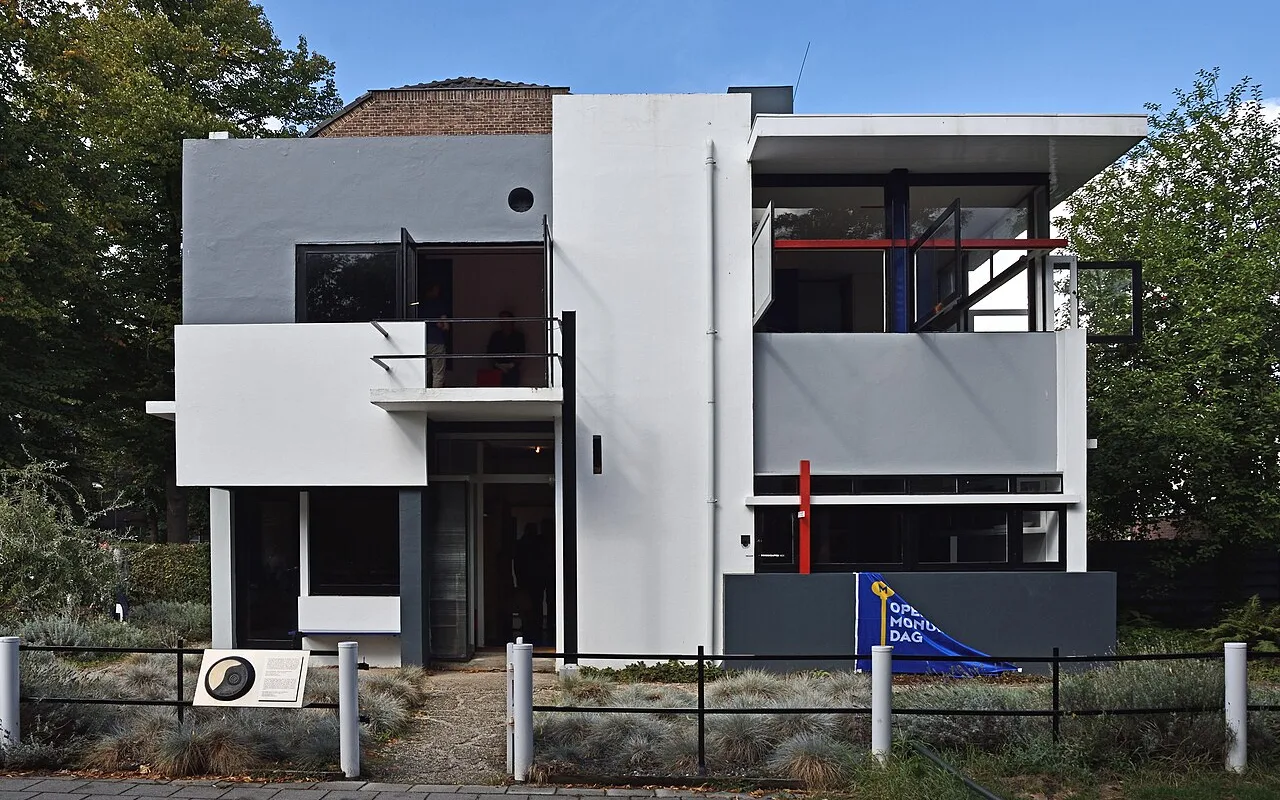 The garden front of the Rietveld Schröder House, with its balconies, roof slab and lines of red